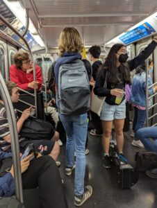 Musicians riding the Subway 